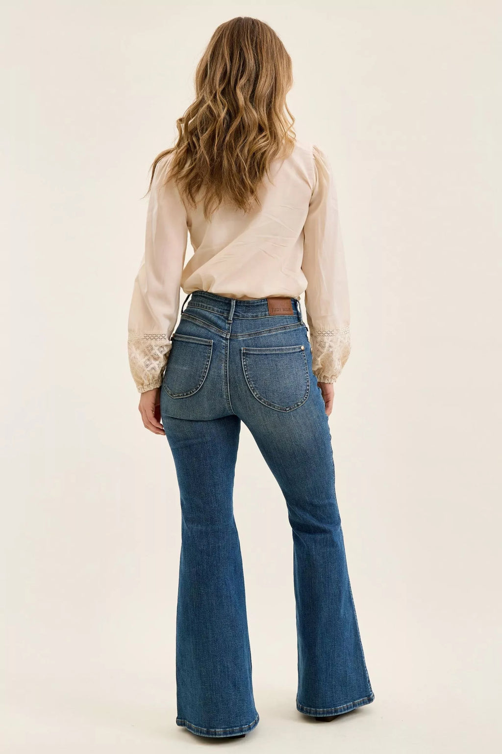 Tummy Control Flare Jeans — view 9